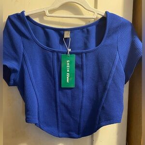 SHEIN EZwear Women's Solid Color
Royal Blue Textured Tee With Curved Hemline